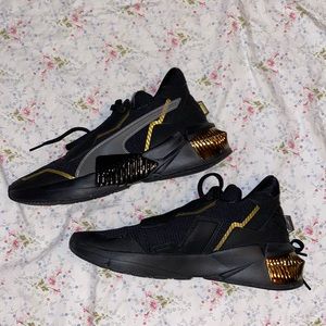 Black and Gold Puma shoes